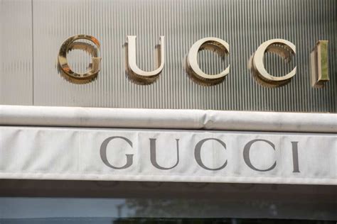 who currently owns gucci.